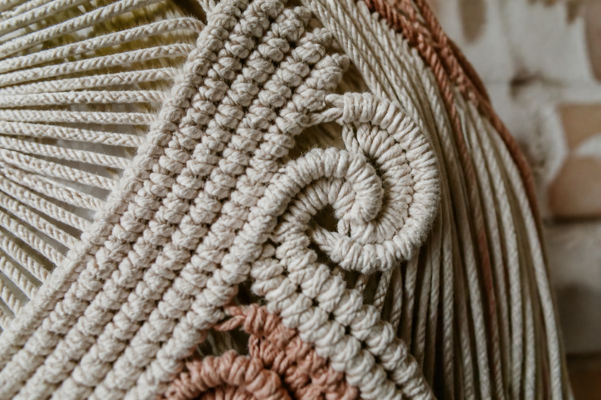Close-up of half-hitch spiral knots in natural cotton rope